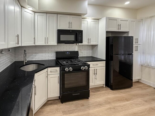 Building Photo - 1687 John F. Kennedy Blvd Unit 1