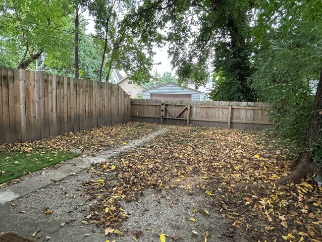 Photo - 3-Bed, 1-Bath Home – Fenced Yard, Off-Street Parking, Spacious Kitchen & In-Unit Laundry