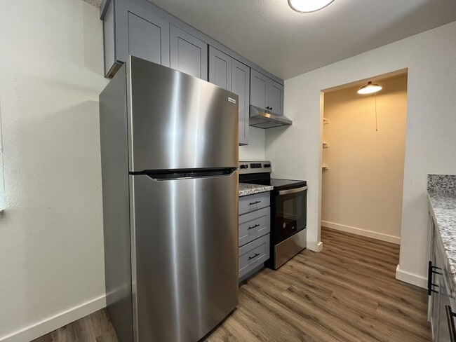 Photo - Updated 1BD Apartment Near Downtown with Balcony & Modern Kitchen Updates off street parking Unit 7721