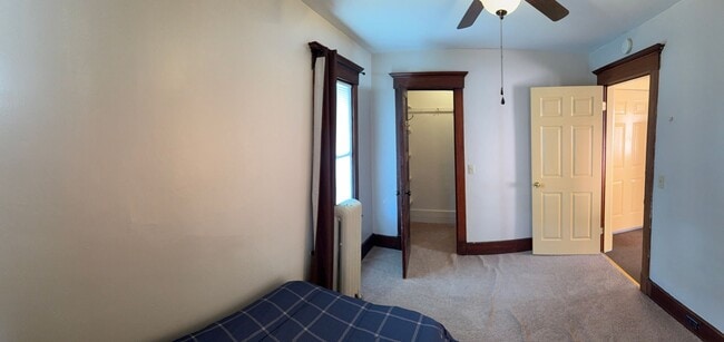 Photo - *NO PET DOGS* Upper 1 bedroom all Utilities included Unit 2 Bed - Front Building - Upper Left