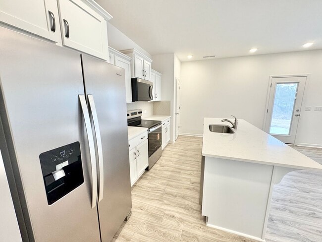 Photo - New 3 br home with loft area and 2 car garage