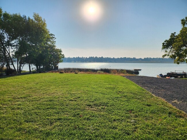 Building Photo - Lake house with Shop on 1/2 acre