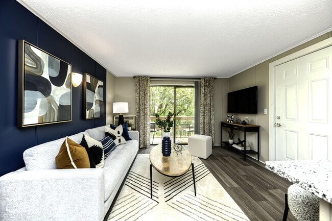 Spacious Living Room with Wood Style Flooring - The Collective at Sutherland Apartments