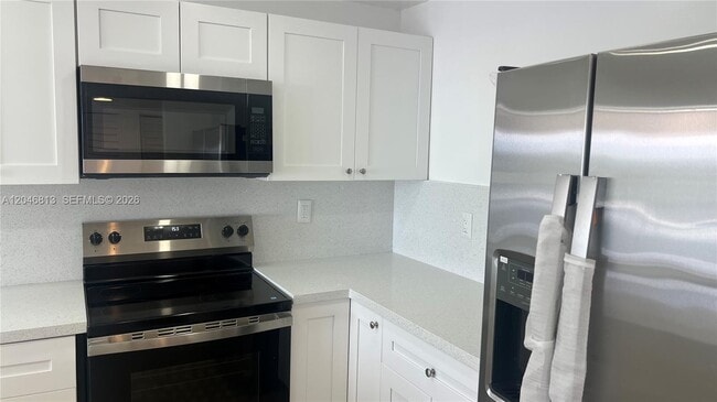 Photo - 488 NW 165th St Unit B-309
