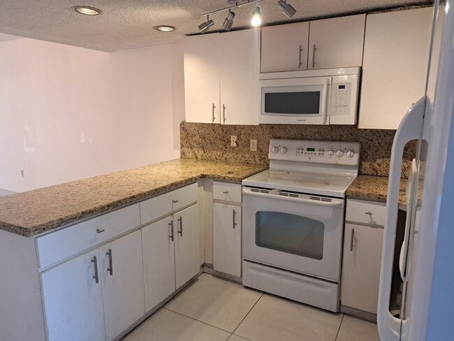 Photo - 5525 W 26th Ct Unit 1st Floor