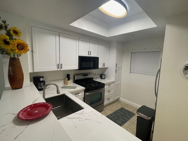 Photo - Meridian 2 Bd / 2 Ba with Laminate Flooring in Living Room & Bedroom Areas
