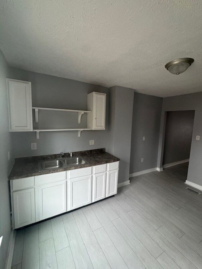 Photo - Completely Renovated 3BR/1BA Townhome located close to downtown Indy.