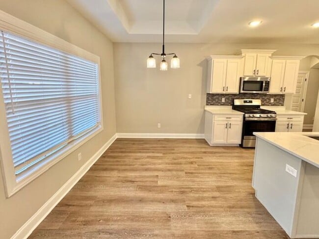 Photo - Exquisite new construction 4BR home now be...