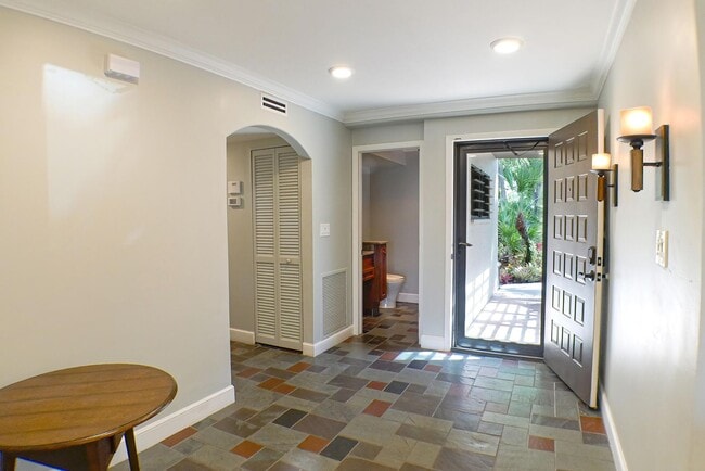 Building Photo - RARE ON MARKET , 2+den 2 1/2 bath overviewing a lake behind bell tower