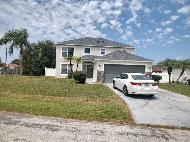 Building Photo - Spacious 4 bedroom, 2.5 bathroom house in Poinciana