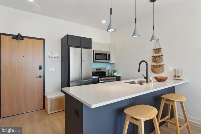 Building Photo - 1775 N American St Unit 214