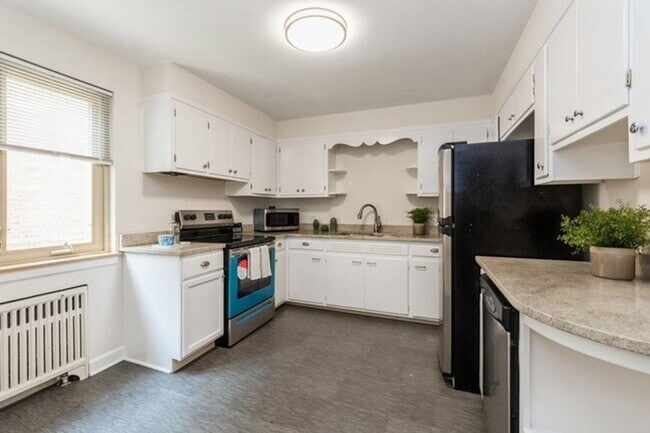 Photo - Spacious 2 Bedroom on Quiet Street featuring Central Air, Fireplace, Dishwasher, Private Screened...