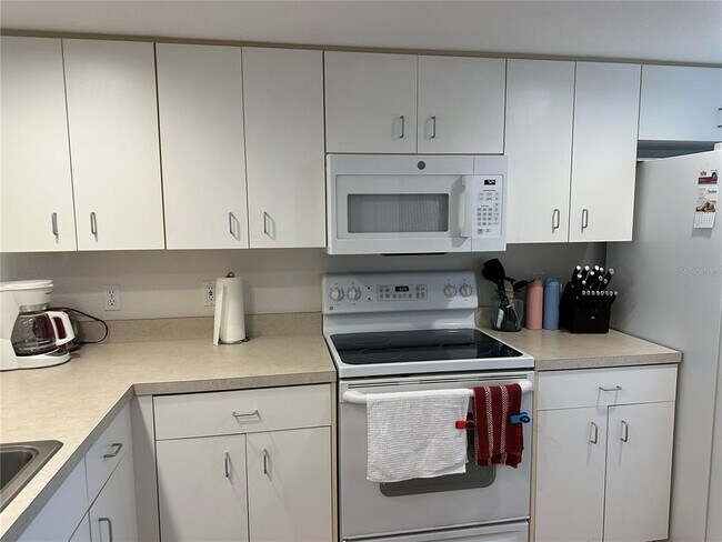 Photo - 9550 Fiddlers Green Cir Unit 105