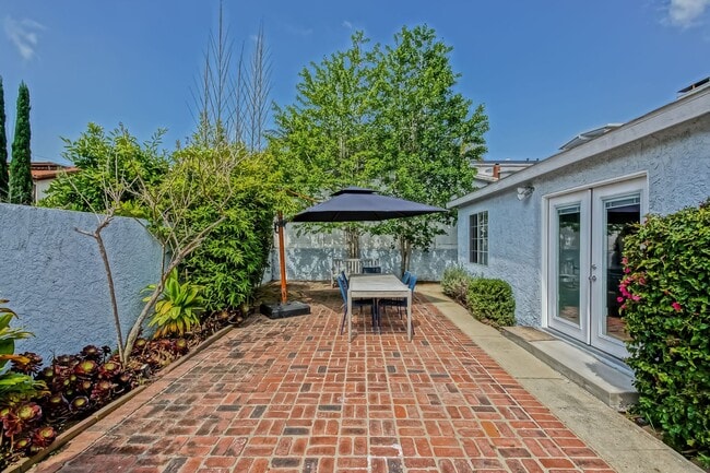 Photo - CHARMING & AIRY HOME W/ SPACIOUS FENCED YARD & LARGE 2-CAR GARAGE CLOSE TO SCHOOLS, SHOPPING & MI...
