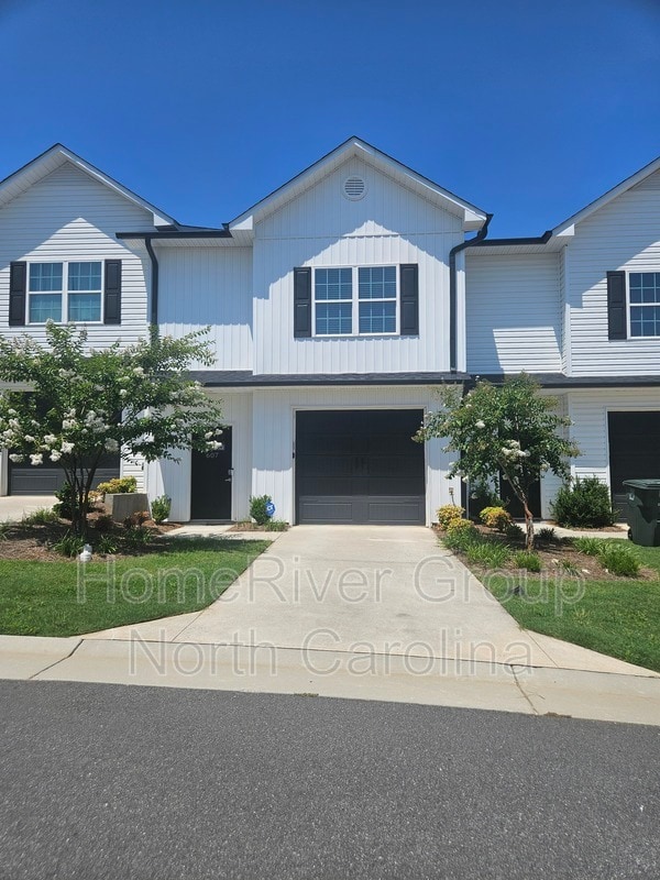 Photo - 607 Pompano Dr Townhome