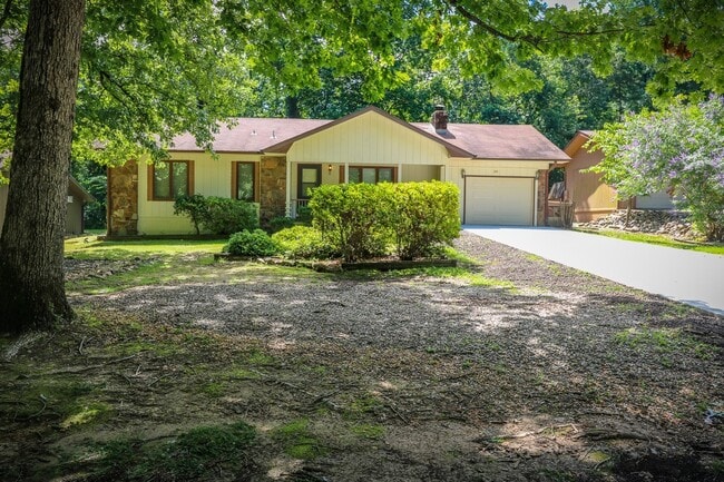 Building Photo - Two Bedroom, 2 Bath, 1-Car Garage, 1179 sq ft feet home with wood burning fireplace. and screened...