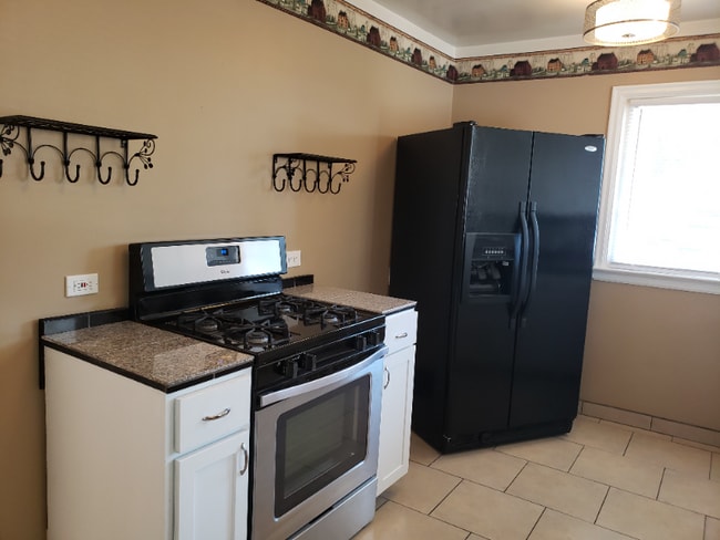 Photo - 825 E 35th Ave