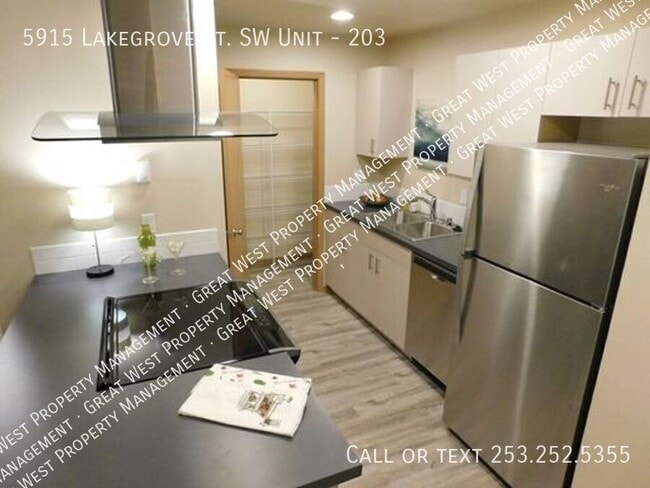 Building Photo - 5915 Lake Grove St SW Unit 203
