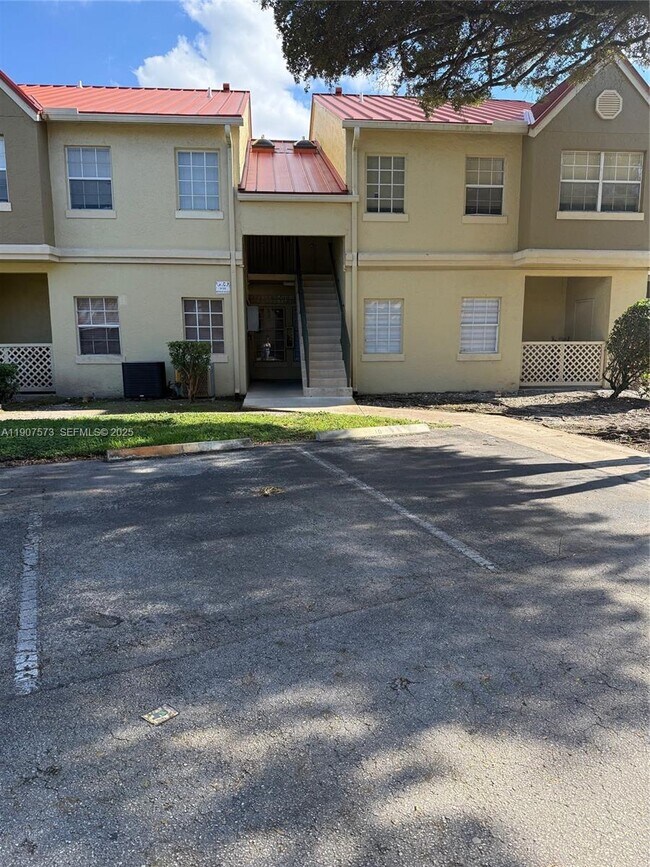 Building Photo - 18308 NW 68th Ave Unit F