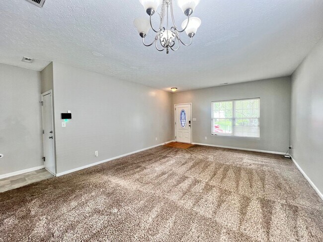 Photo - Charming 4BD, 2.5BA Durham Home with a Bonus Sun-Room & Fenced In Yard Only 10 Minutes Away from ...