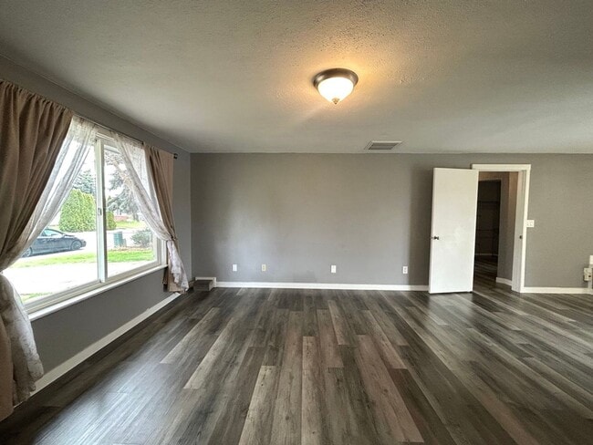 Photo - Charming 4 Bedroom Home with Fully Fenced Yard