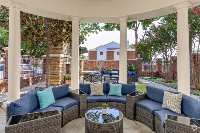 Outdoor Veranda with Casual Seating and Fireplace - The Livingston Apartments