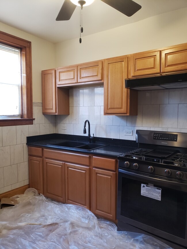 Kitchen - 8231 S Elizabeth St Apartments Unit 1