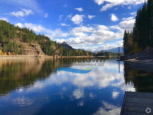 Building Photo - Riverfront Home on .62 acre Lot with Dock ...