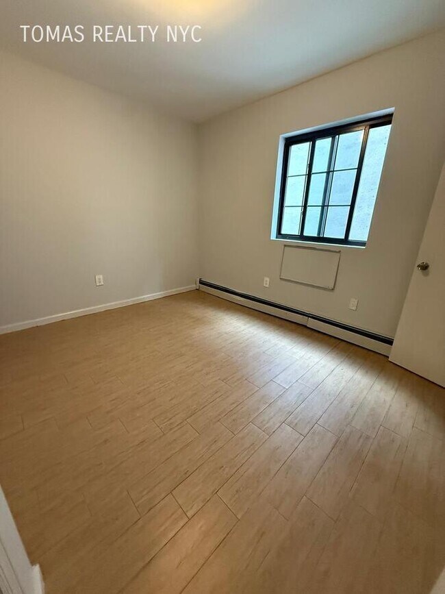 Photo - 727 E 181st St Unit 2