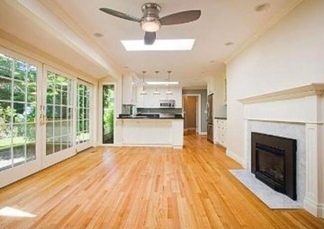 Building Photo - Spacious & light filled home with a garage, backyard, storage & hardwood floors throughout