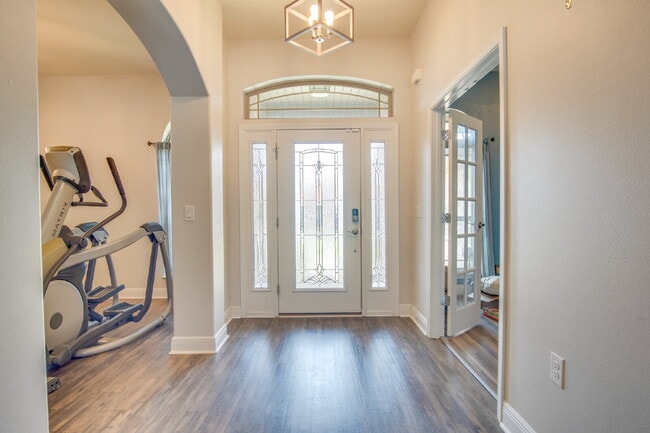 Photo - Milton 4BR Pool Home with Office, Vaulted Ceilings, Screened Saltwater Pool & 2-Car Garage