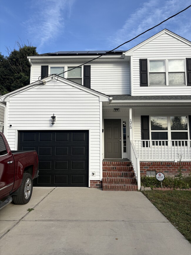 Solar panels and brand new garage installed with garage opener. - 1215 Commerce Ave House