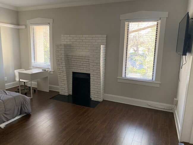 Work table and Fireplace - The Residence at 1743 N Decatur