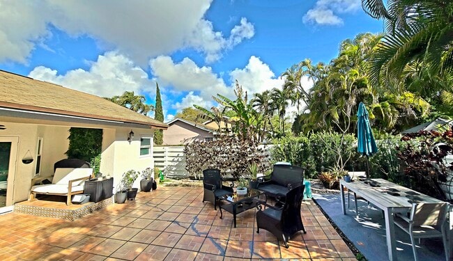 “Private, beautifully landscaped patio – perfect for relaxing” - 14653 SW 145th Ter