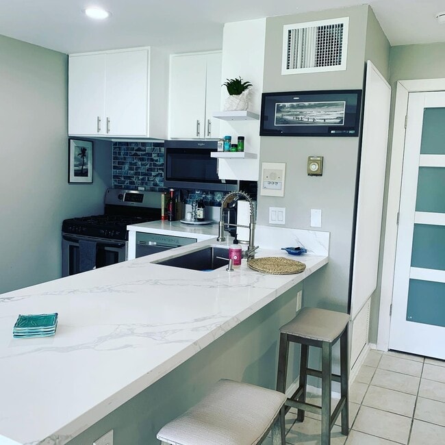 Building Photo - 3653 S Bear St Unit F Rental