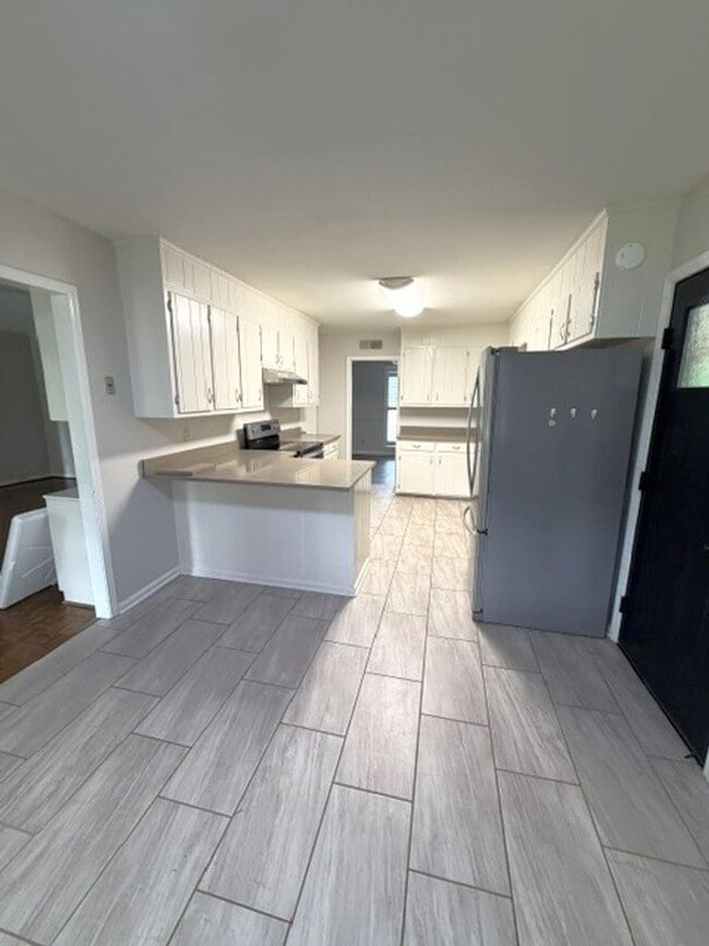Photo - 4 bedroom 2 bath house in Woodridge available August 1st!