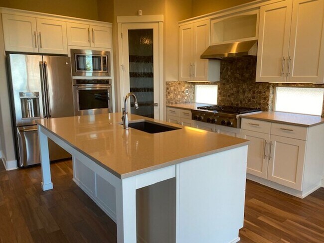 Photo - Custom home looking over Rivers Edge golf course