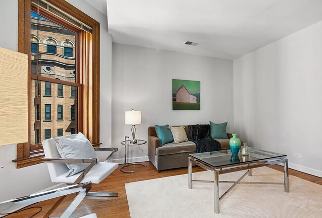 Photo - Chic 1-Bed Condo with Hardwood Floors in Prime Chicago Location!