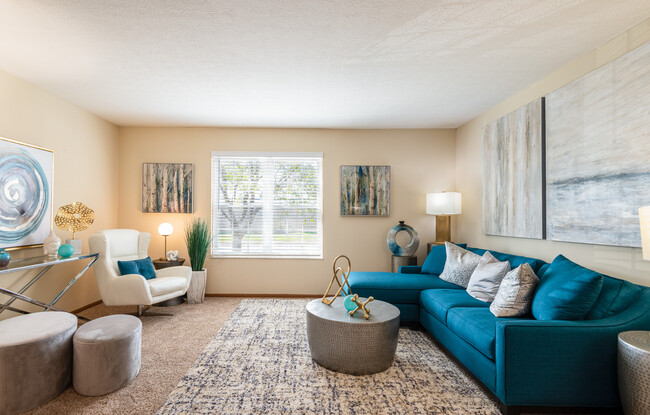 Spacious Living Room with Wood Style Blinds - The Residences At Breckenridge Apartments