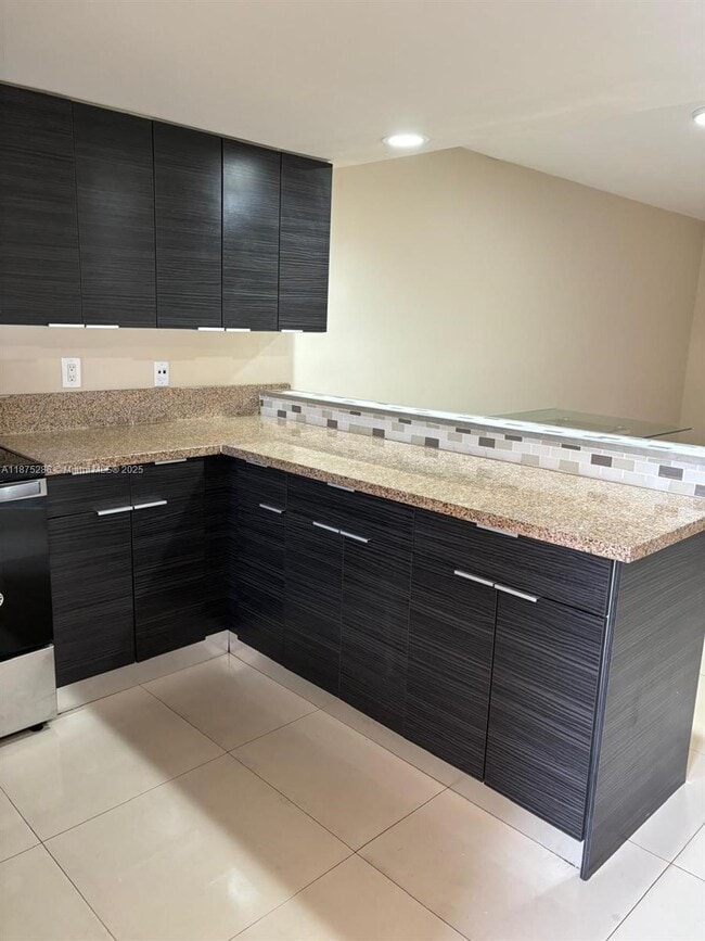 Building Photo - 5650 W 26th Ct Rental