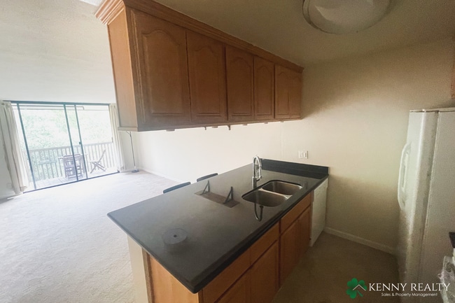 Photo - Top Floor One Bedroom - Easy Access to Garage Parking + Great Amenities