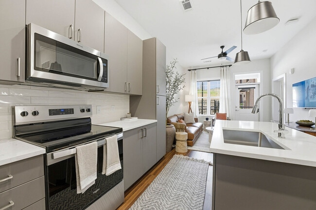 Kitchen with premium materials and window with natural view