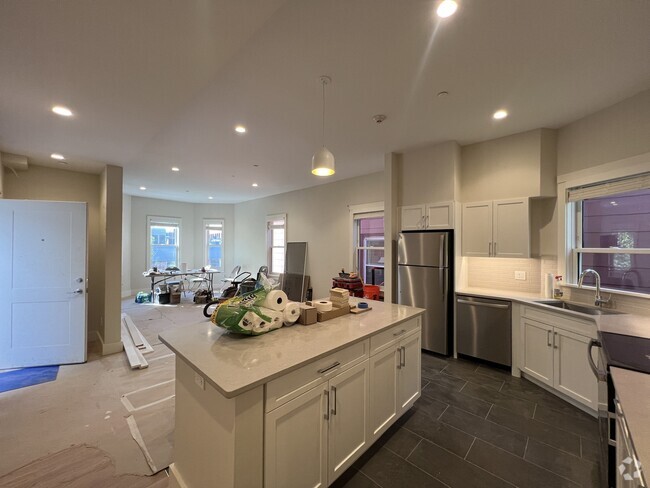 Building Photo - 56 JFK St Unit 2 Rental