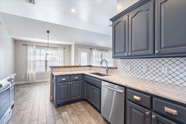 Photo - Discover this spacious 4-bedroom, 2-bath home