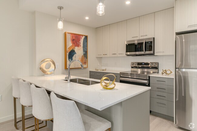 1 chambre, 1 salle de bain - 559 pi² - Cuisine - Aspire