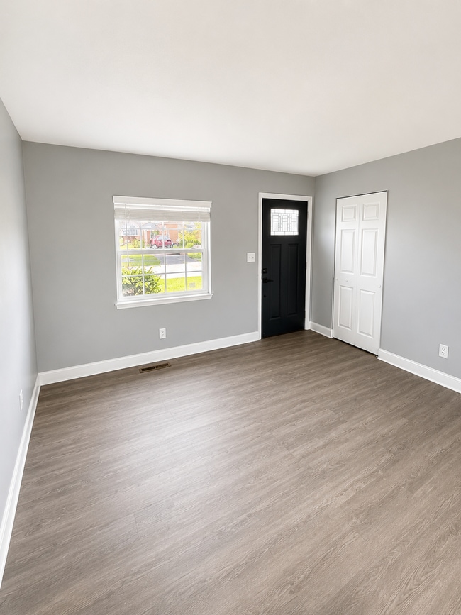 Photo - Stylishly Renovated 3-Bedroom Home with Finished Basement & Spacious Fenced Yard