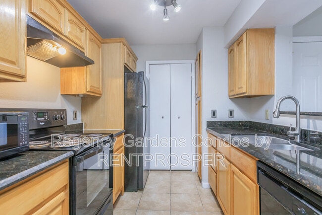 Building Photo - 4301 Lizshire Ln Unit 210 Rental