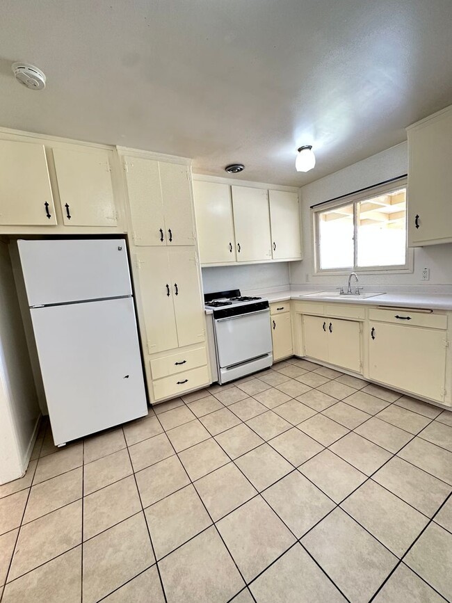 Photo - Beautiful House 3RB/1BA Single Family Home with 2 Car Garage & Large Fenced Backyard.