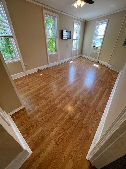 Living Room/Dining Room with Fireplace - 2432 E Norris St Unit 2