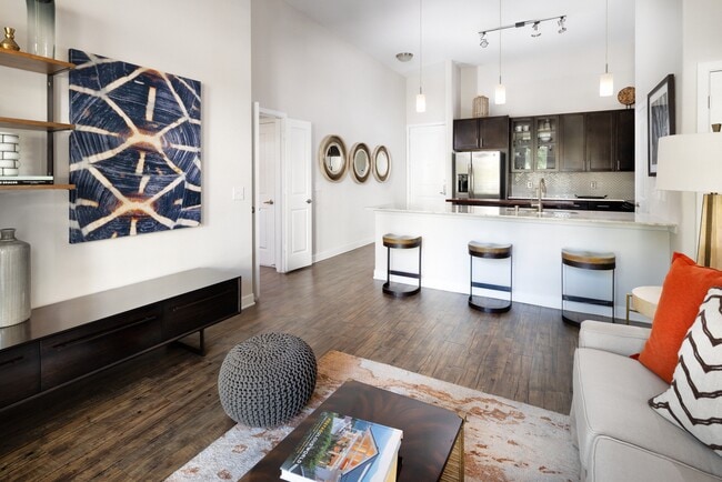 Kitchen, living, and dining areas with hard-surface vinyl plank flooring throughout - Avalon Lakeside